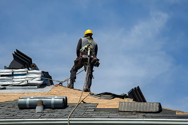 Professional Roof Replacement technician working in Dennis, MA